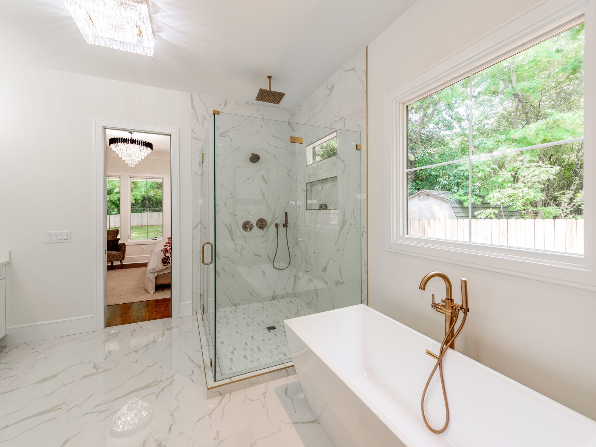 Primary bath with freestanding tub and glass-enclosed walk-in shower — Brantham by Stillman Properties Charlotte NC