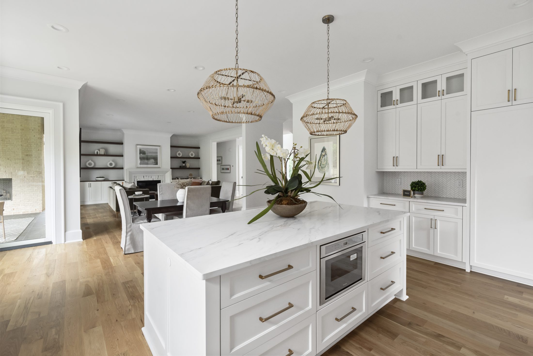 Kitchen island with built-in desk nook and open shelving — Bywood by Stillman Properties Charlotte NC