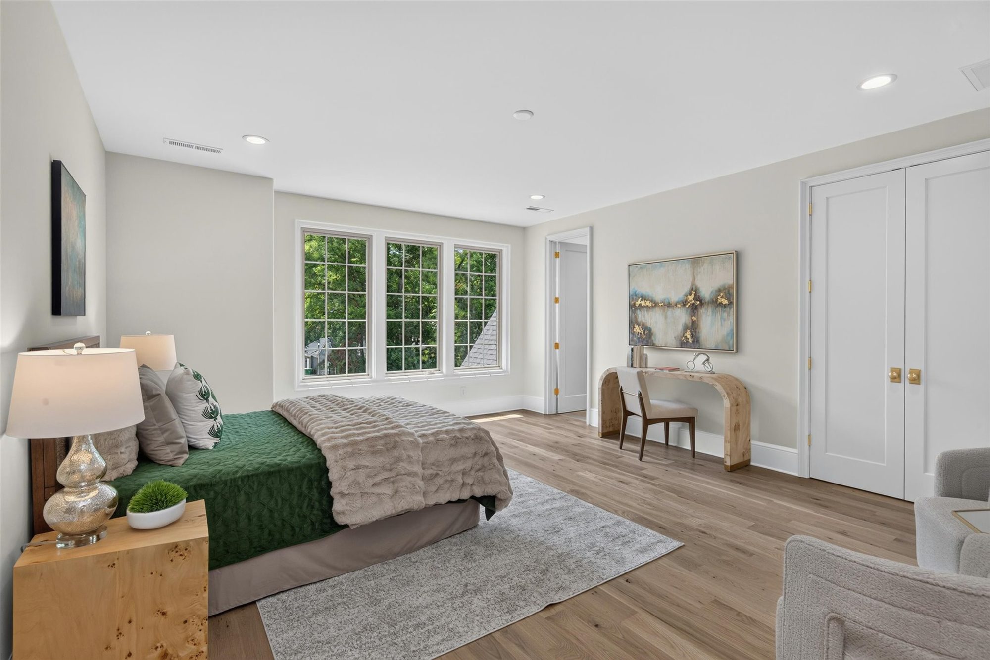 Bedroom at Heather with a three-window bay, built-in double closet, and desk nook — Heather by Stillman Properties Charlotte NC