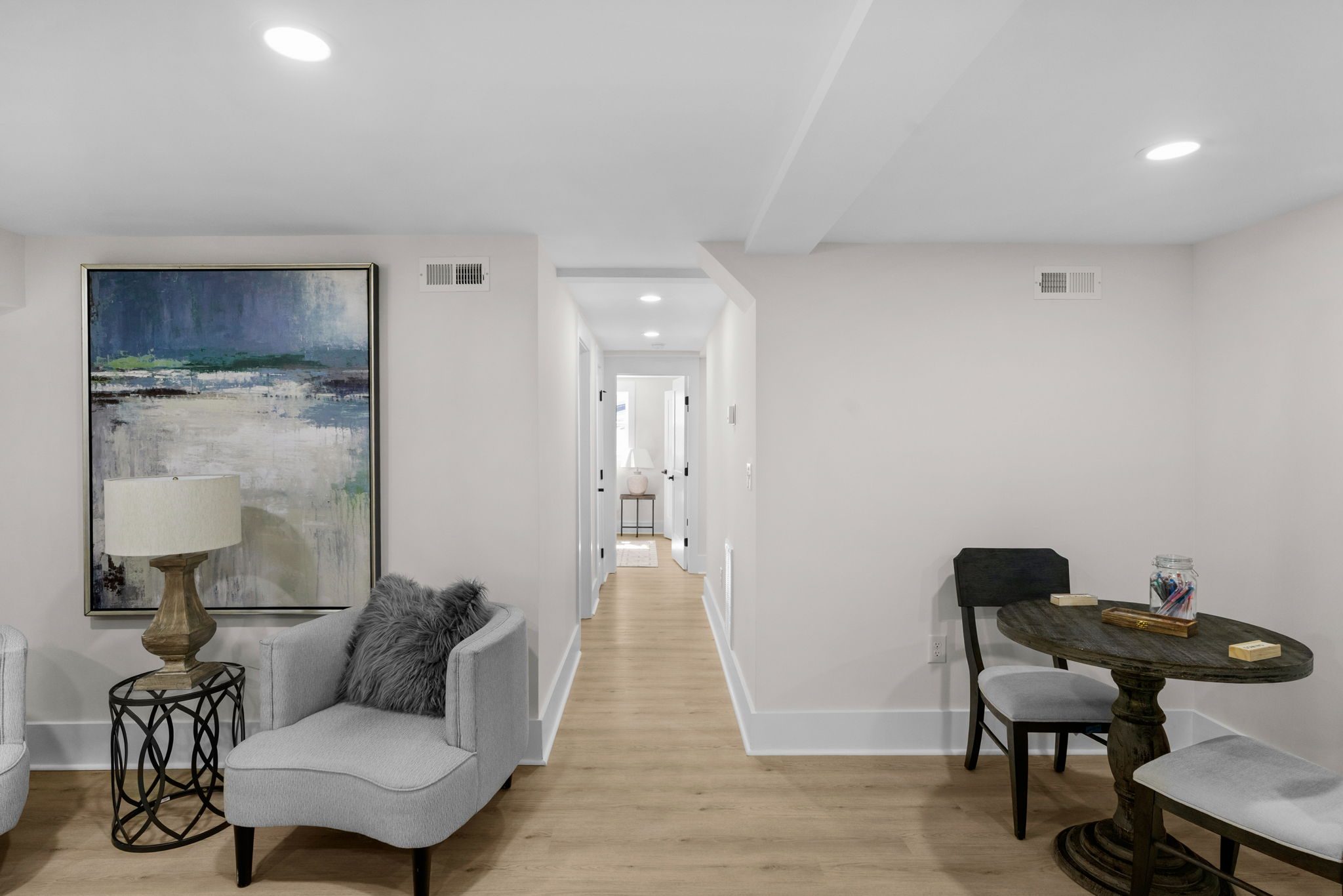 Lower-level hallway connecting the second living suite — Wyanoke by Stillman Properties Charlotte NC